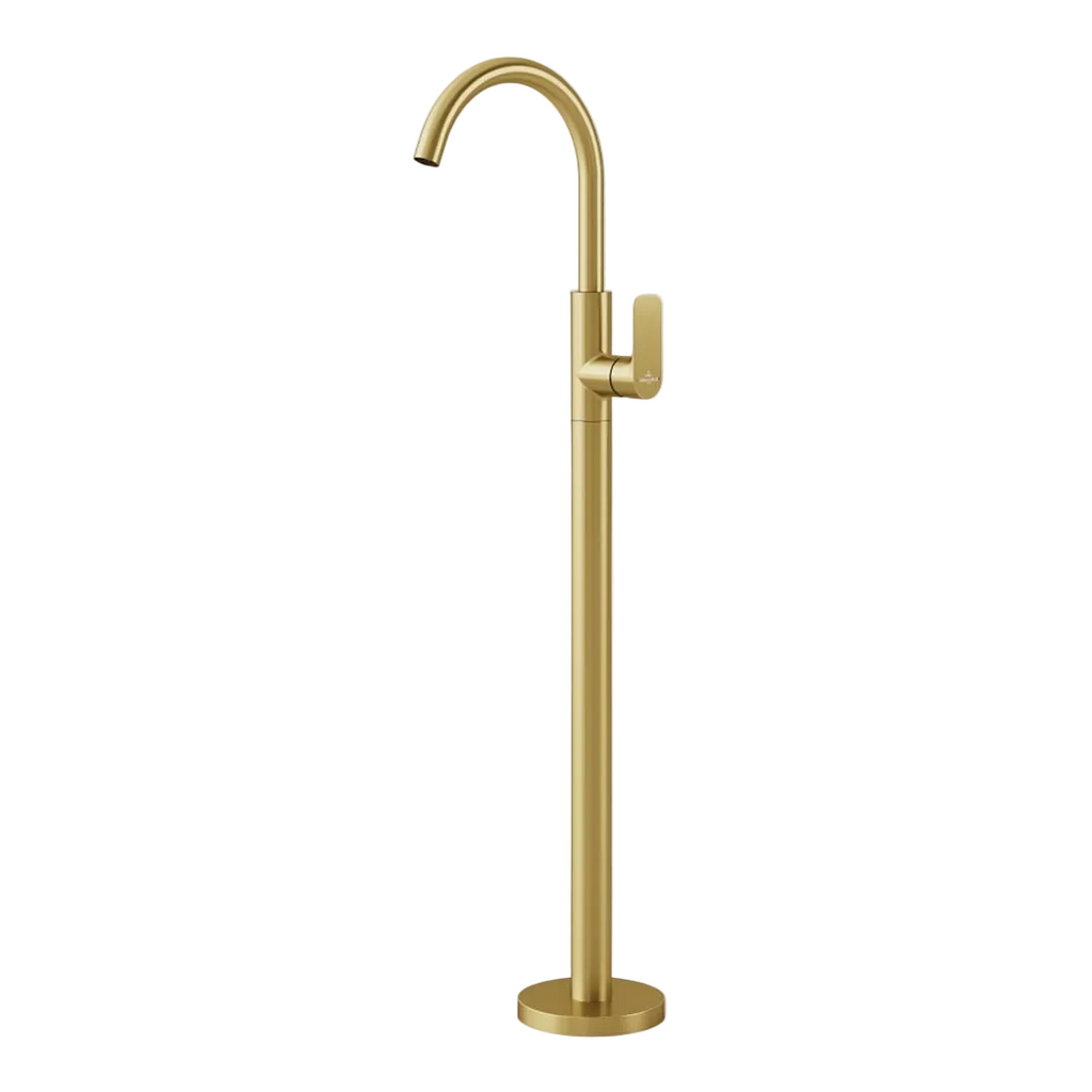 A modern matte gold floor-mounted faucet with a curved gooseneck spout and a single lever handle, shown against a solid light gray background.