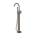 A modern freestanding bathtub faucet in a dark brushed metallic finish, featuring a high-arc spout, a vertical post with a round base, a hand shower hose, and a side-mounted lever handle, shown against a light gray background.