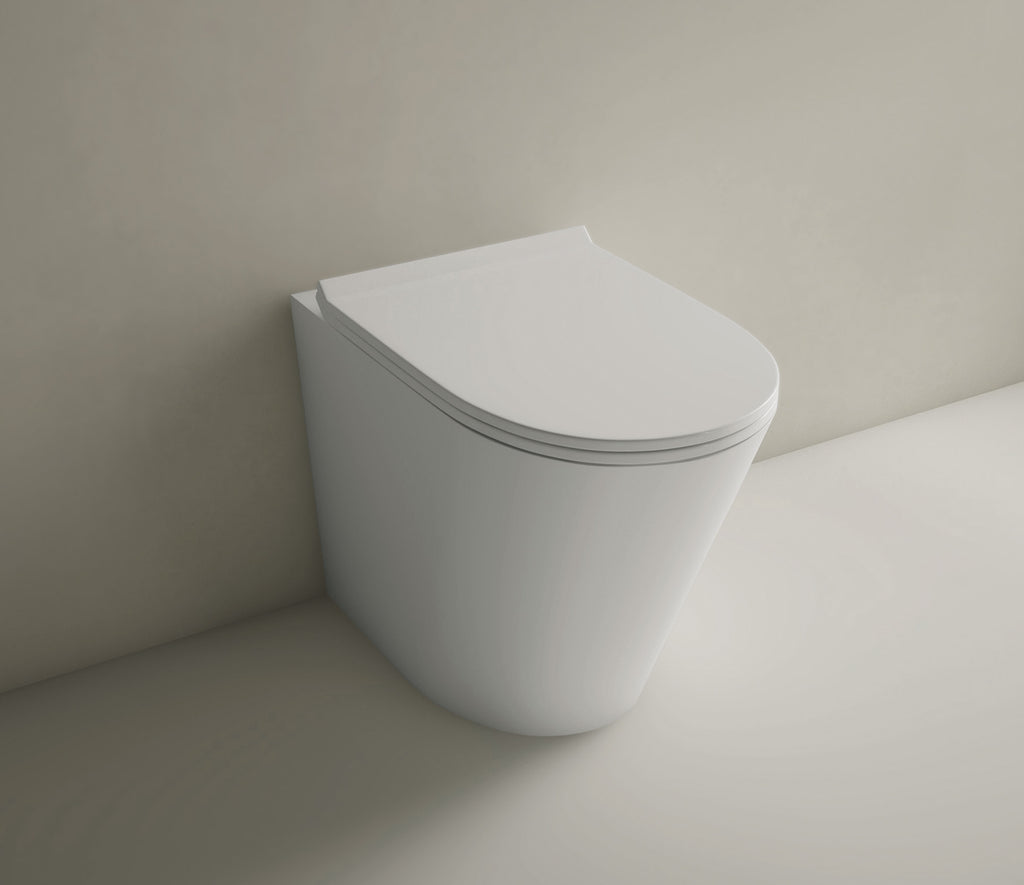 Studio Bagno Manhattan MAN002 Gloss White Wall Faced Pan including Oli 74 (Pneumatic) Cistern & Brushed Stainless Steel Button - MAN002 + 601602/PN + OL093399
